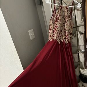 I’m selling a maroon size M fiesta fashion prom dress